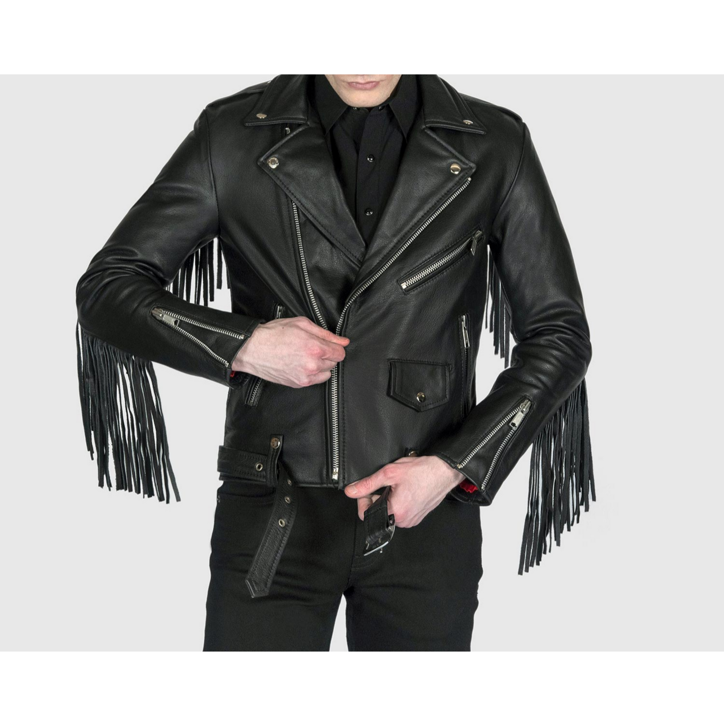 Front view of model wearing men's black fringed slim fit biker leather jacket with belted waist and western-style fringe on sleeves