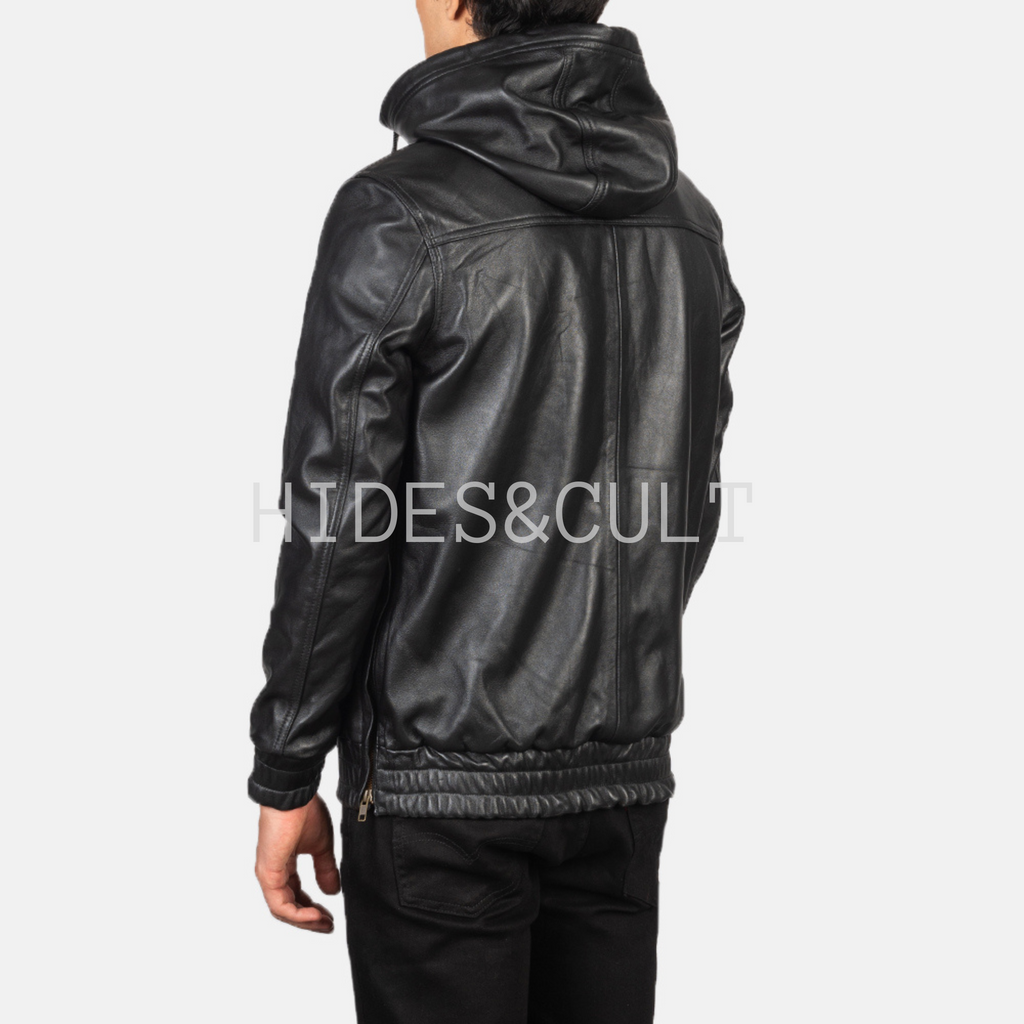 Back view of men’s black genuine leather hoodie jacket with smooth texture and detailed paneling, designed by Hides & Cult.