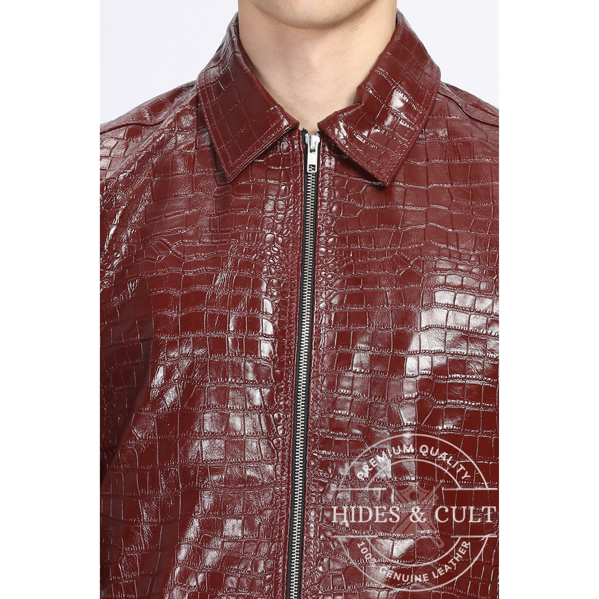 Close-up of crocodile pattern, zipper and texture detailing on Hides & Cult handmade genuine leather jacket

