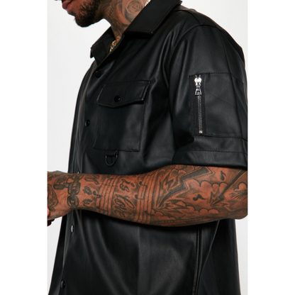 Close-up of men's black genuine leather shirt, showcasing the fine texture and premium full-grain leather used for durability and style