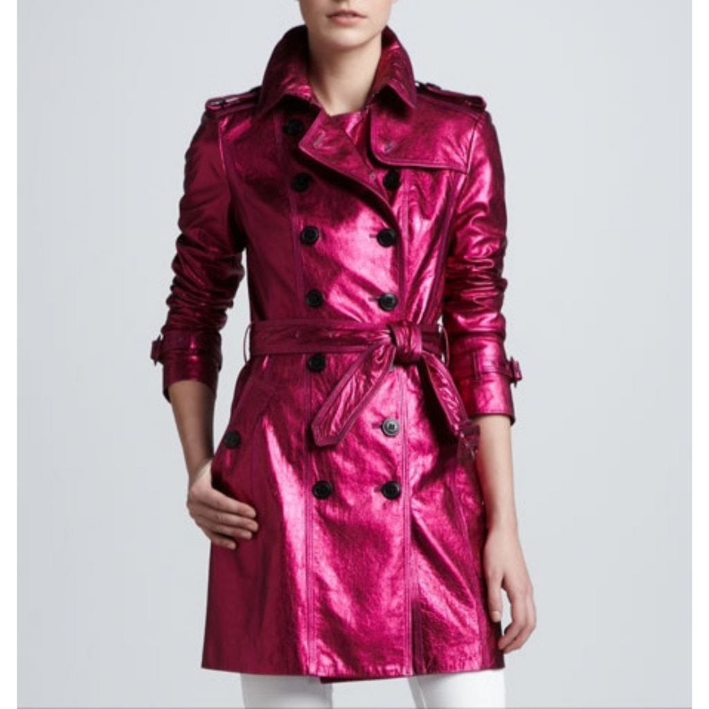 Close-up of pink metallic foil leather with double breasted buttons on trench coat

