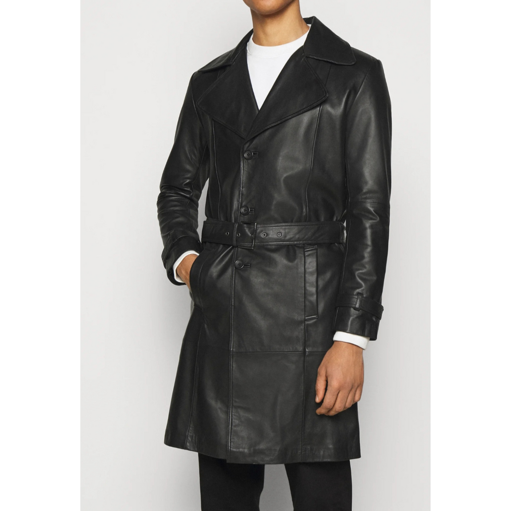 Front view of model wearing men's black belted genuine leather trench coat car coat with notch collar and long length