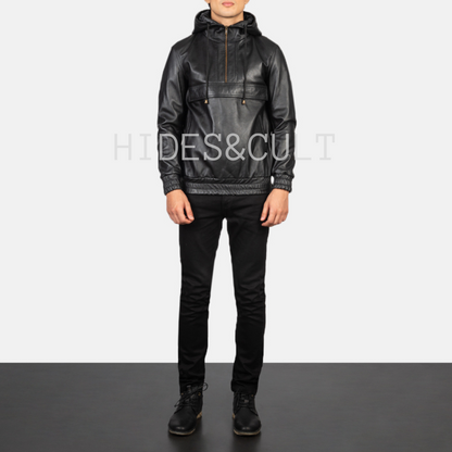 Full-length shot of male model wearing black leather hoodie jacket and black pants, styled for urban streetwear by Hides & Cult.
