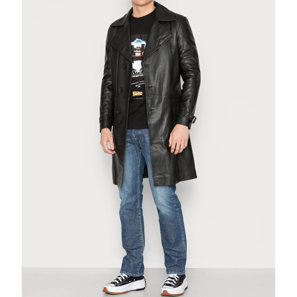 Full view of model wearing men's black belted genuine leather trench coat car coat with notch collar and longline silhouette