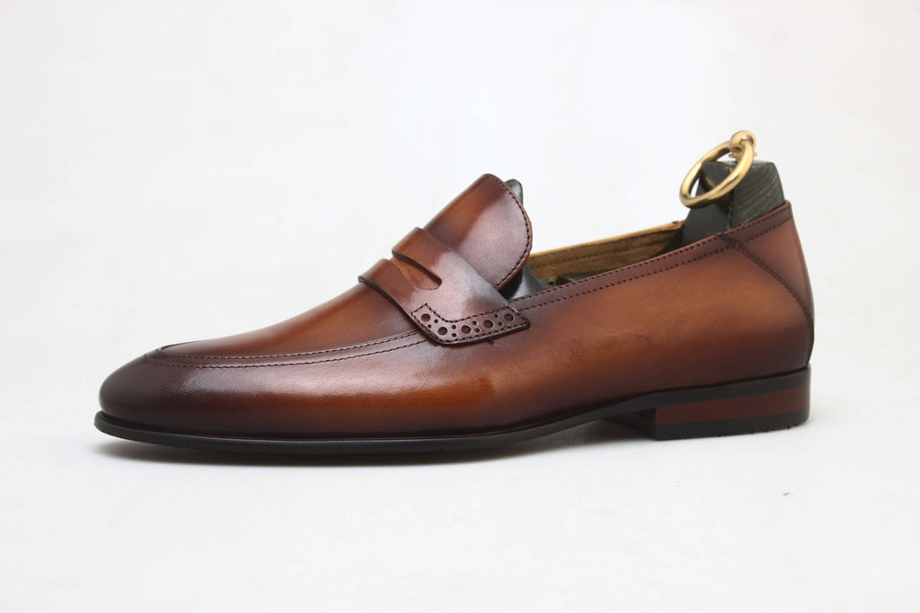 Handcrafted brown leather penny loafers for men – elegant and durable formal shoes perfect for office wear, weddings, and smart casual outfits.