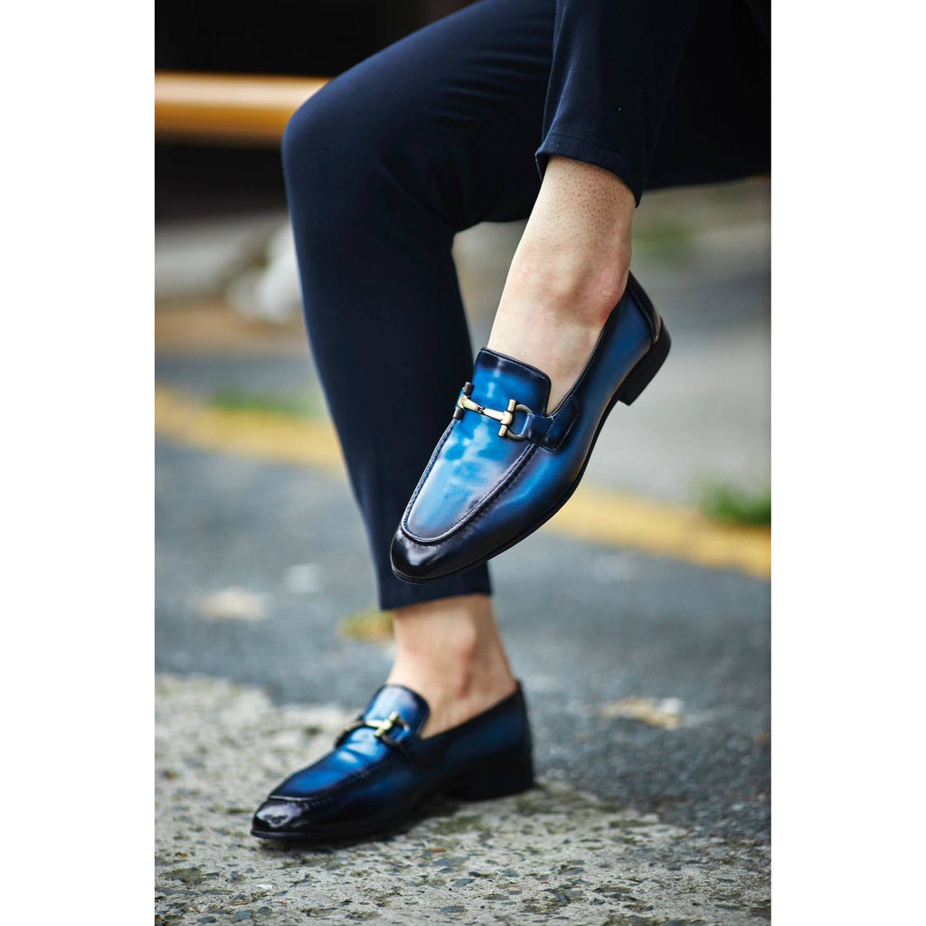 Handcrafted blue patina leather loafers for men, featuring a glossy finish and metal buckle – perfect for formal and statement wear.