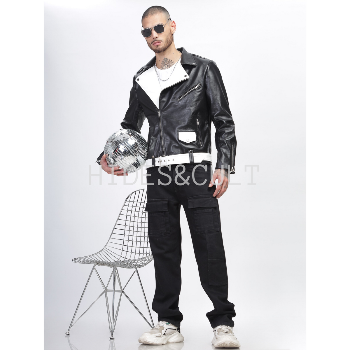 Men's black and white two tone slim fit motorcycle biker belted leather jacket front view worn by model