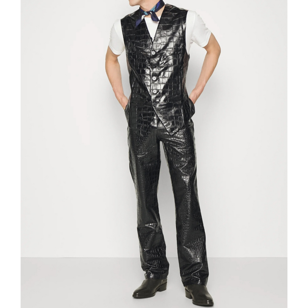 Model wearing men's leather pants and matching leather top, showcasing a stylish, modern look with premium full-grain leather craftsmanship – Hides & Cult
