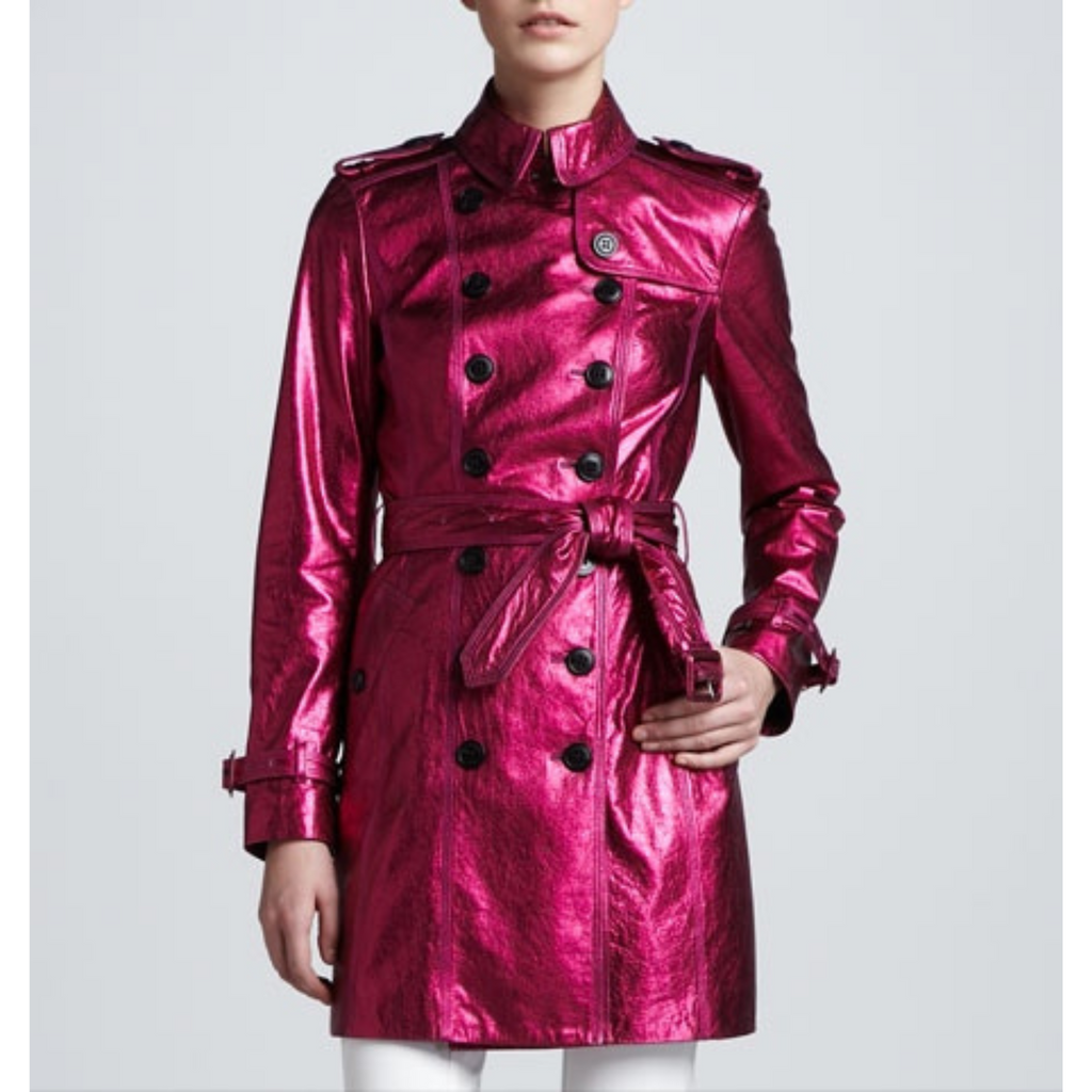 Side angle of fuchsia pink metallic leather trench coat double breasted style on model