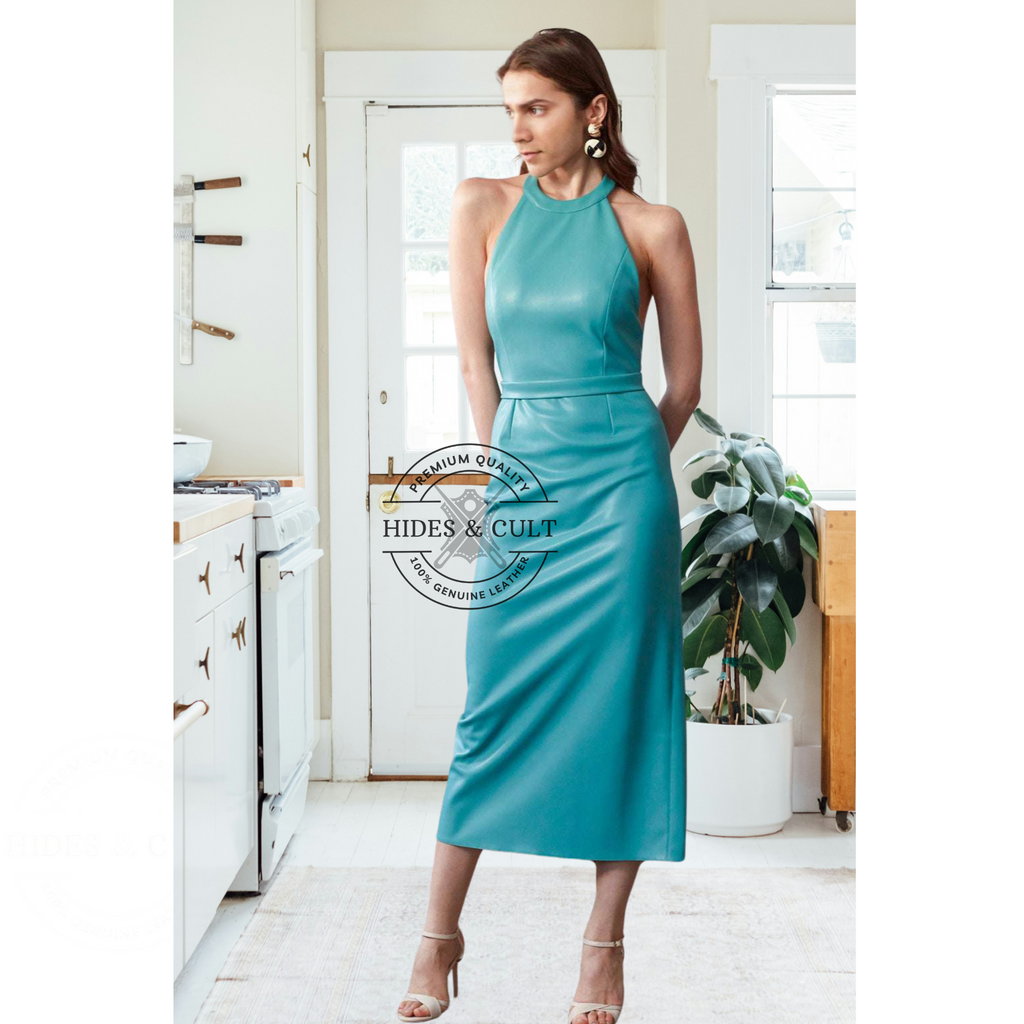 ide angle of teal blue leather midi dress halter neck design on model