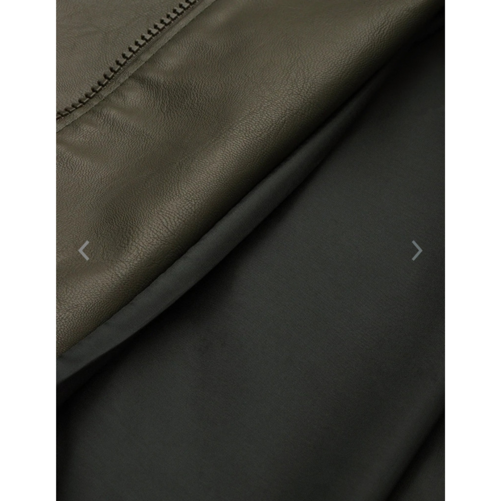 Overhead shot of  genuine leather jacket showcasing material texture 
