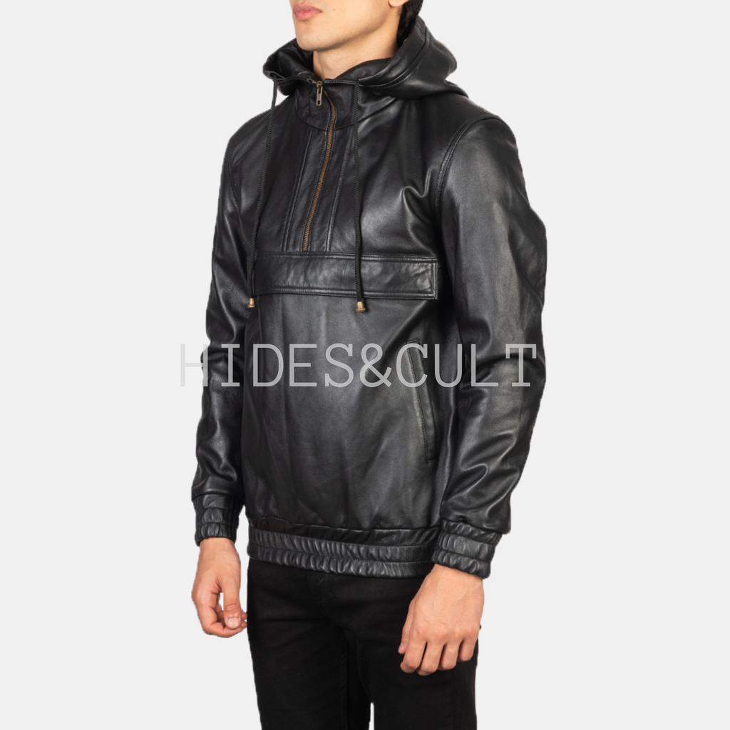 Side profile of model wearing a black leather hoodie jacket with front zipper and kangaroo pocket, handcrafted by Hides & Cult.