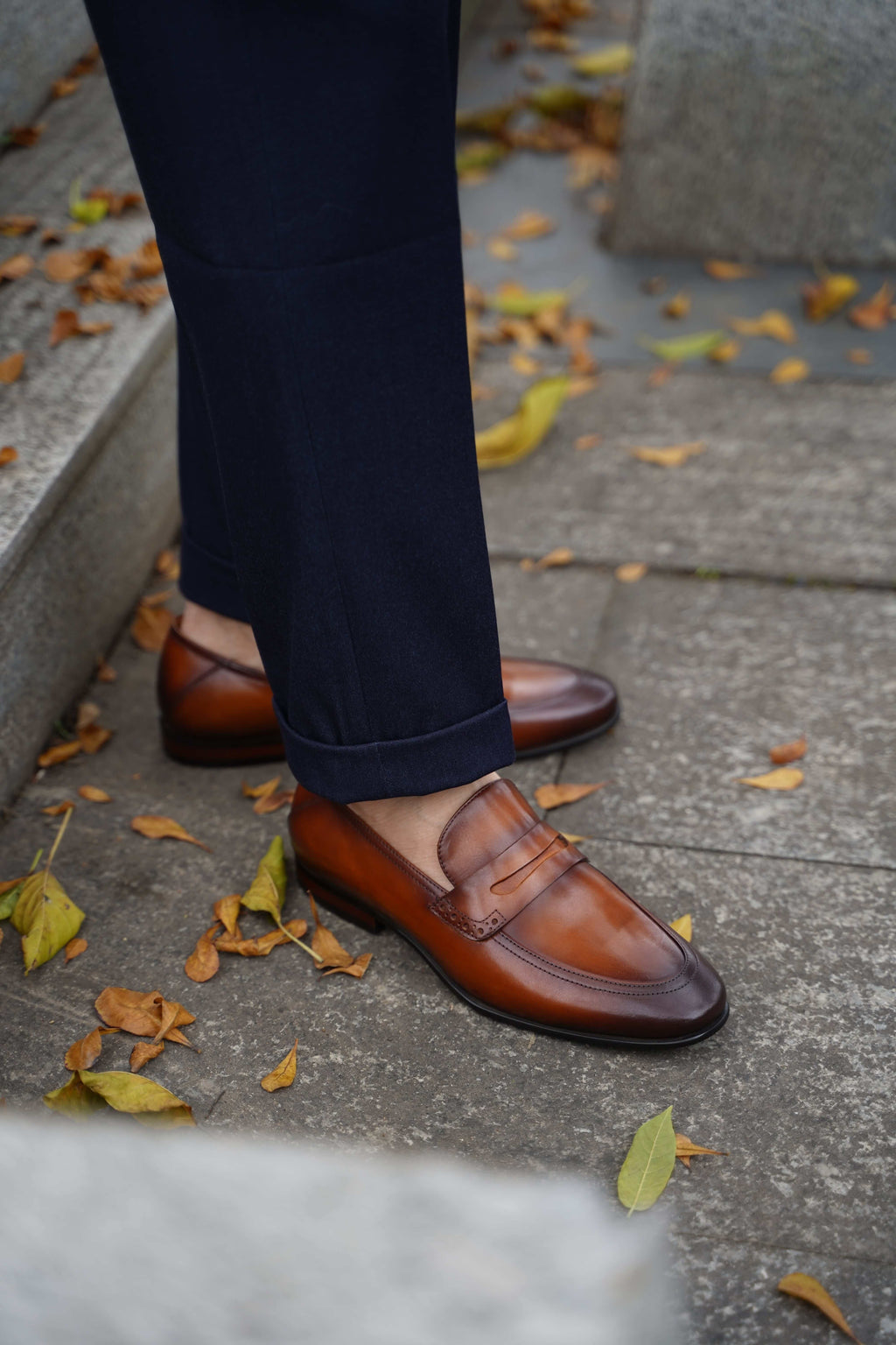 Handcrafted brown leather penny loafers for men – elegant and durable formal shoes perfect for office wear, weddings, and smart casual outfits.